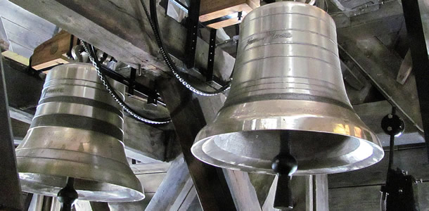 External Bell hammers for strikes and ringing motors above arc wheels
