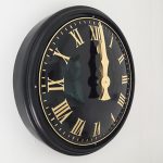 Roman Bezel clock finished in gold leaf.