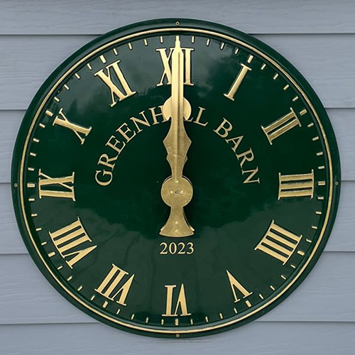 Roman clock finished in gold leaf