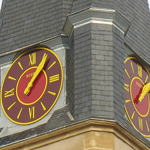 Coloured and glazed external clock dials mechanisms and controllers.
